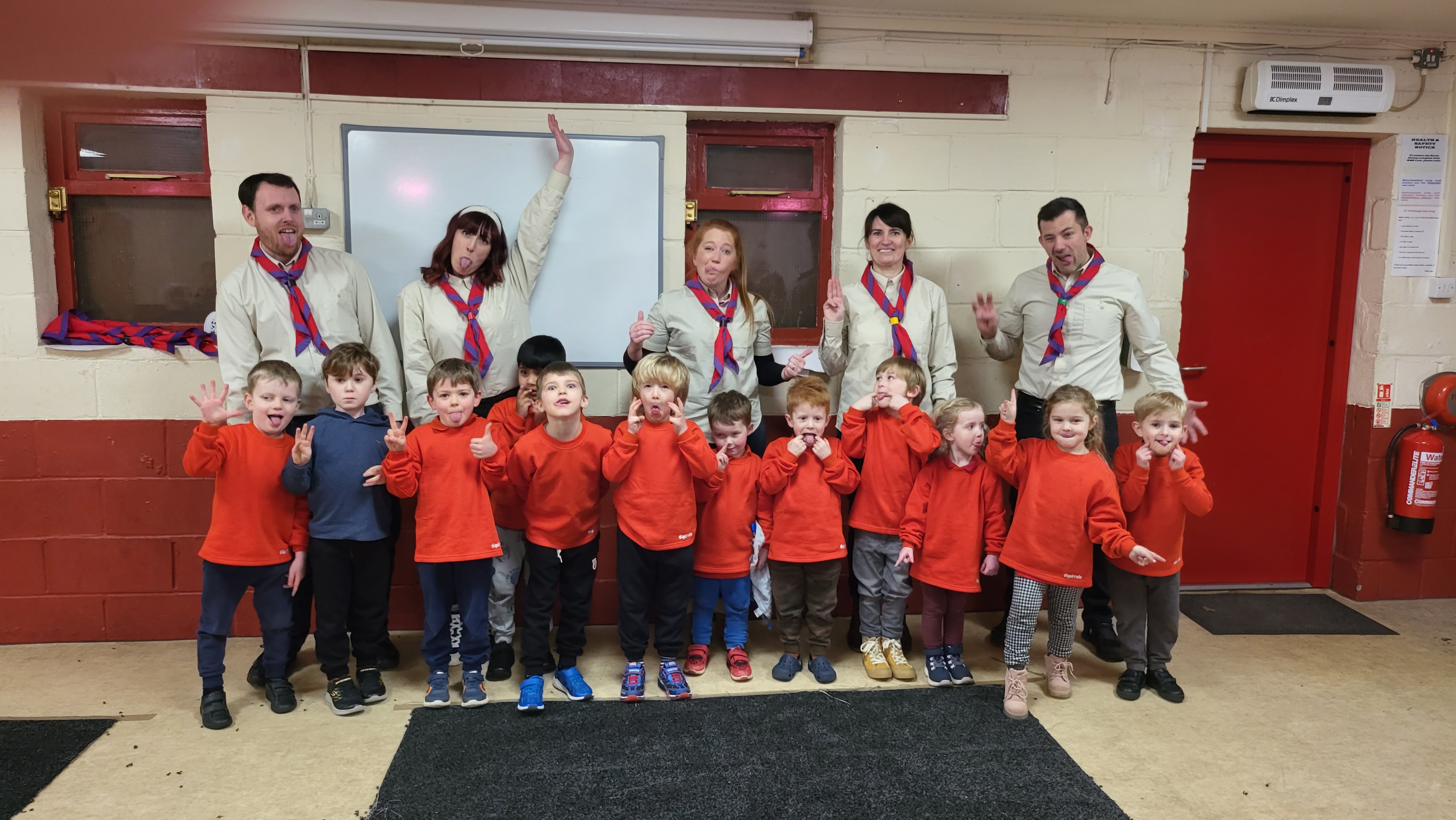 A picture of our newly invested Squirrels with their Section leaders.